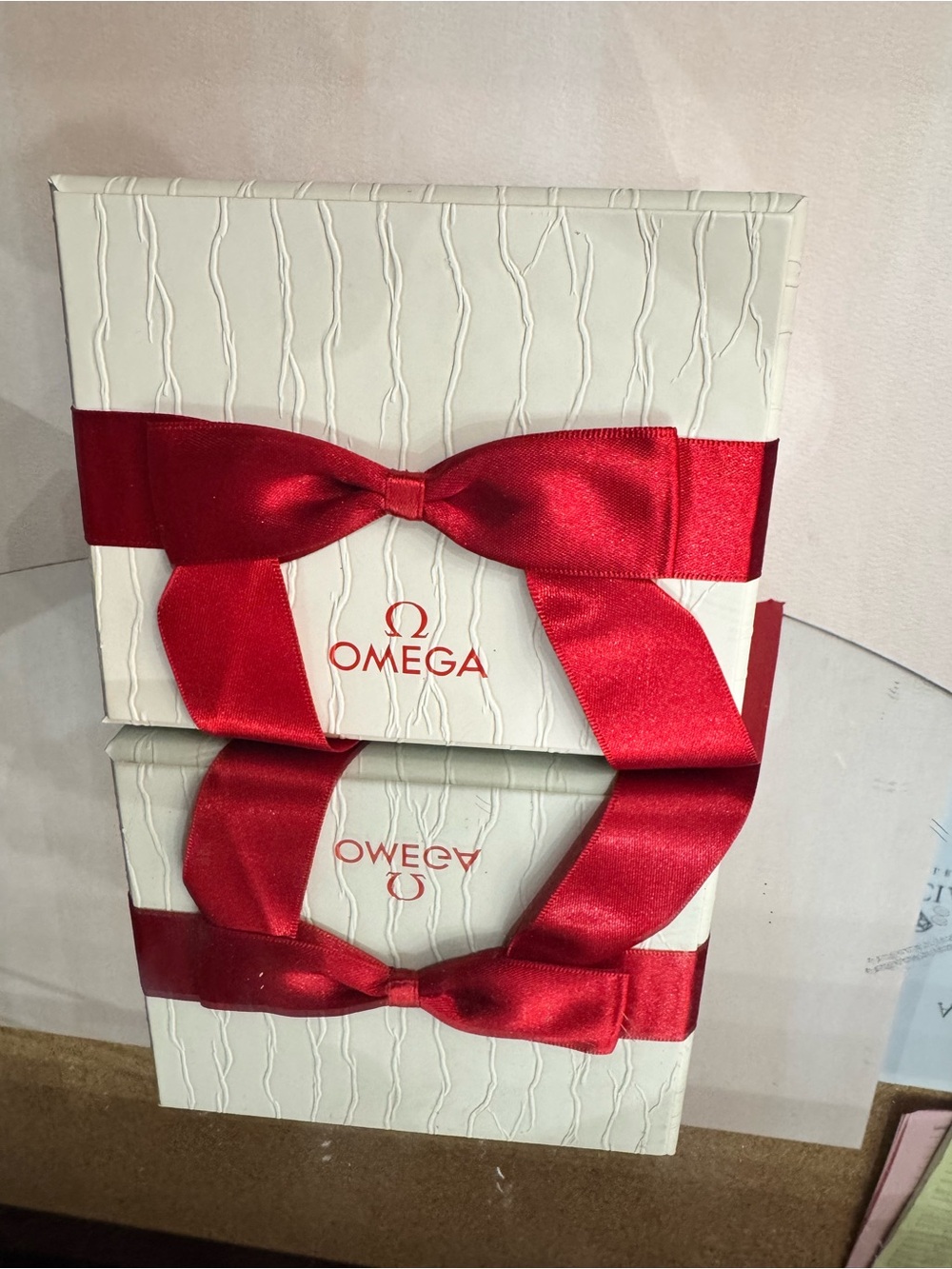Omega White Gift Box with Red Ribbon